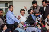 Musharraf Greeted in Pakistan by Threats and Small Crowds