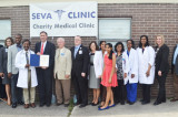 Congressman Pete Olson Presents Certificate of  Congressional Recognition to Seva Clinic