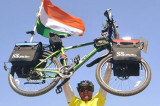 Bicyclist Sharma Travels the Globe to Highlight World Peace, Ecology
