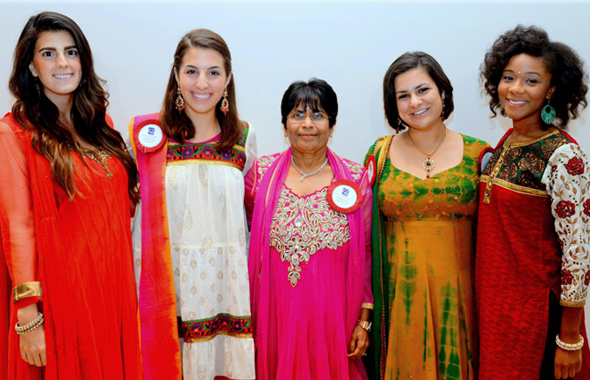 Sewa International Houston President Sarojini Gupta (center) with the Americorps volunteer interns.