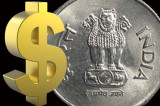 Rupee recovers to 58.39 on suspected RBI intervention