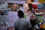 Nelson Mandela responding to treatment but still critical