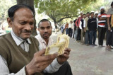 Withdrawal limits at banks, ATMs raised; new Rs 500 notes launched