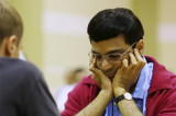 Anand survives a scare against Anish Giri at London Chess Classic Anand survives a scare against Anish Giri at London Chess Classic
