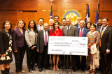In Harvey’s Wake, IACF Presents a Check of $200,000 to the Mayor of Houston