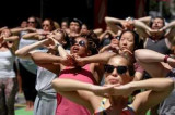 Over 700 Americans perform yoga in Texas Over 700 Americans perform yoga in Texas