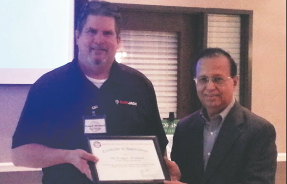 ASIE Board of Advisor Dinesh Shah (right) presenting a Certificate of Appreciation to Speaker Craig Wooard of RamJack.