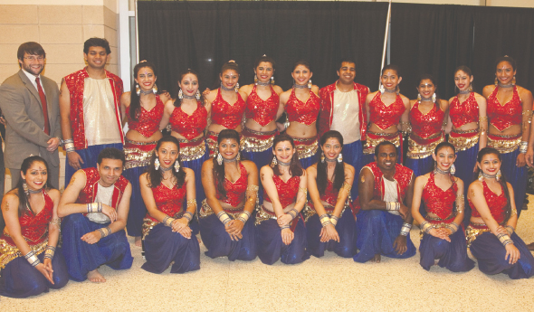 Arzan Gonda (center first row) with her Rhythm India dance troupe after their performance at the Toyota Center last Friday, April 12. John Donovan with the Toyota Center is on the upper left. Photo: Navin Mediwala.