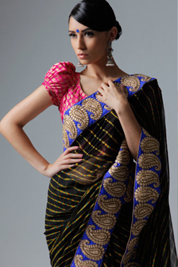 A model showcasing a black Lehriya Saree from the Aura collection.  Photo: Brian Styles