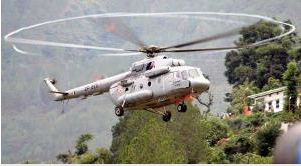 An IAF helicopter MI-17 V5 during rescue operation in Gauchar on Tuesday. (PTI Photo)