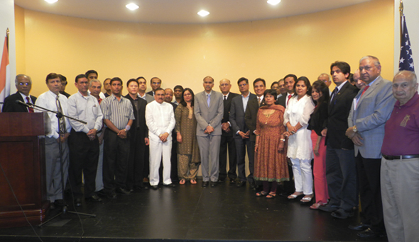 The leaders of the different Indo American organizations with the Indian Consul General P. Harish (center in suit) next to Sugar Land Fire Chief Juan Adame (in black uniform).         Photos: Jawahar Malhotra