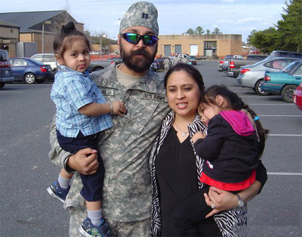 U.S. Army Major Kamaljit Kalsi is shown here with his wife Chinar and their two children before his 2011 deployment to the Helmand Province in Afghanistan, where he headed up a field hospital. (Ranjeet Kalsi photo via Facebook) Read more at http://www.indiawest.com/news/12151-crowley-urges-defense-to-allow-turbaned-sikhs-in-u-s-military.html#zuPwmVxjltTWHQoG.99 