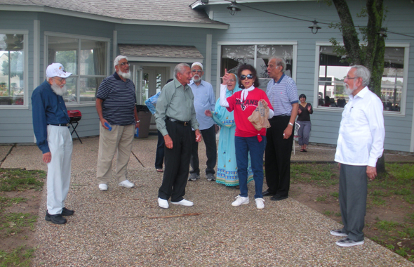 Volunteer Rahat Kalle with Members Taiyeb Shipchandler,Kamaruddin, (oldest members of Club 65) planning a walk.