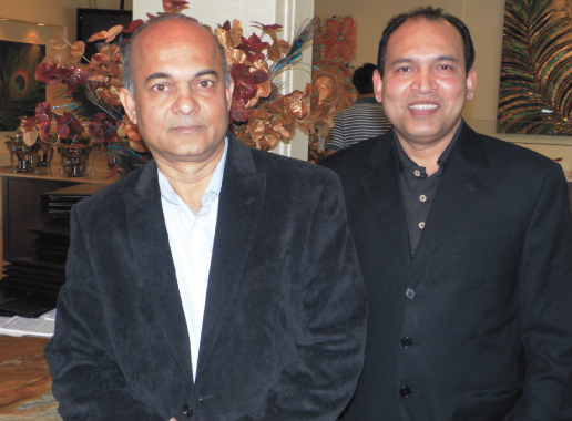 Nirvana General Manager Mansour Allam (left) with manager Mahmood Ahsan at the front entrance of the new location of the restaurant.