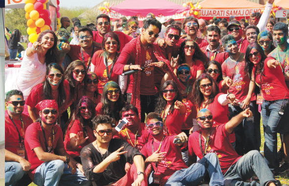 Masala Radio crew with pop star Raghav (front, center) at the Holi Mela at Seabourne Creek Park on Sunday, March 30.