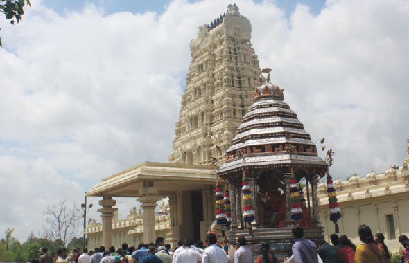 The majestic Raja gopuram raises behind the beautiful Silver Chariot on Sita Rama Kalyanam at Sri Meenakshi temple