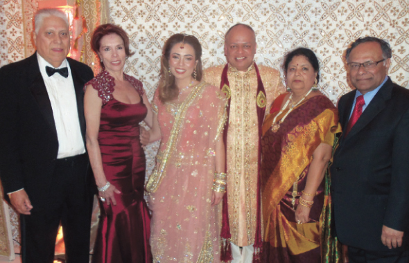 The newlyweds Lillian Fernandez and Abhishek Prasad with the bride’s parents Dr. Carlos and Martha Fernandez and the groom’s parents Rita and Raghunath Prasad after the wedding ceremony at the Safari Texas Ranch this past Saturday, April 12, 2014.
