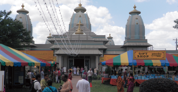 Thousands of people came to attend the Grand Opening of the new Hare Krishna Temple, including these people on Sunday, May 18