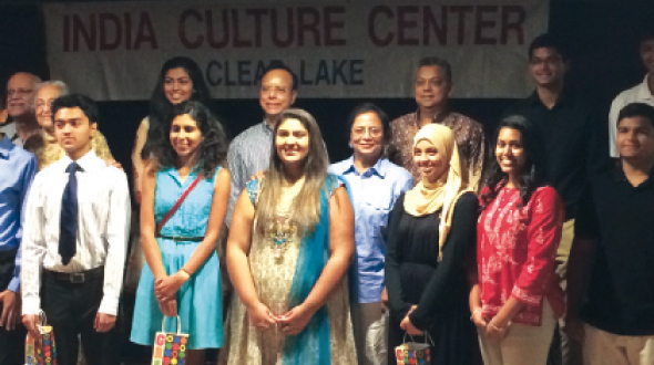 Graduating high school students of Indian origin (front row) stand with ICC Clear Lake senior citizesn, including Dr. Syamal Poddar (center, rear), who gave the keynote address.