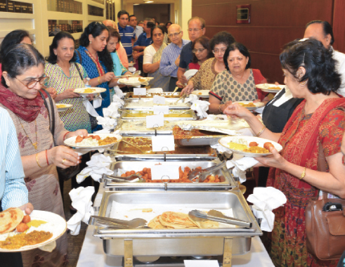 Attendees enjoying the authentic Bangalorian food catered by Udipi restaurant.