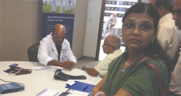 Dr. Mahendra Jain(left)  organized a health fair and diagnostic counselling with representatives from Houston Methodist Sugar Land Hospital, Randall’s and his own practice.