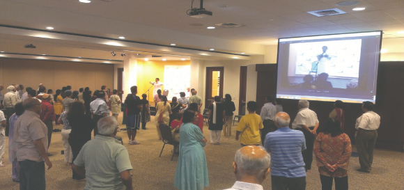 Attendees participating during the Yoga session at India House on Tuesday, July 22.Photo: Vanshika Vipin