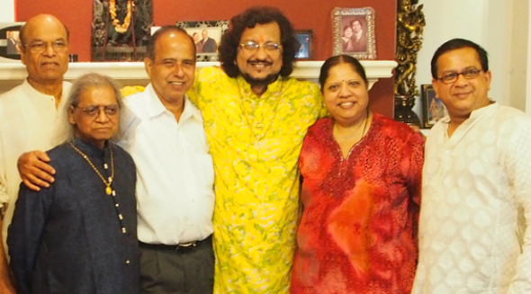 Govinda Shetty, Suresh and Usha Shenoy and Sanjay Rao with the artistes post-concert.
