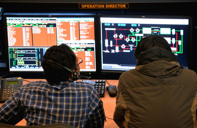 Indian scientists and engineers at the Indian Space Research Organization monitor the Mars Orbiter Mission at the tracking center, ISRO Telemetry, Tracking and Command Network in Bangalore Nov. 27, 2013 (Getty Images)