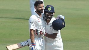Virat Kohli and Wriddhiman Saha on the second day of India vs Bangladesh Test in Hyderabad on Friday.(AFP)