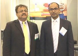 Picture on Right: T J Sinha (left), President of Dartex Industries Inc, Texas at his booth with Deputy Indian Consul General Surendra Adhana at the OTC.