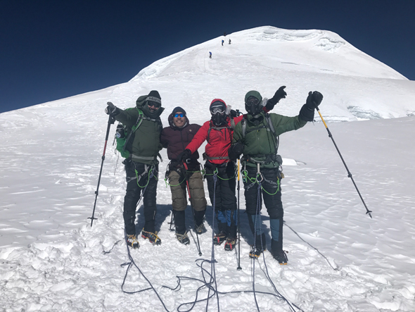 From left: Rick Pal, Dawa Sherpa, Navraj Pradhan, Mike Hobson. Post summit with Mere Peak behind us.