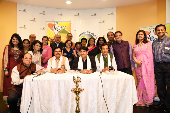 The boards of the International Hindi Association Houston Chapter and the India Culture Center posed with the three poets and IHA president Swapan Dhairyawan (back row, center). 