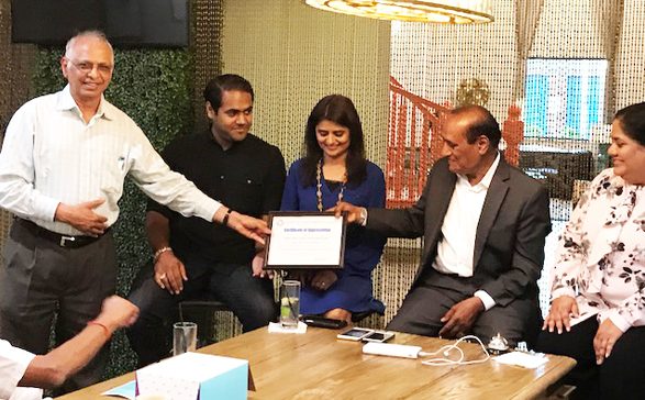 ASIE Architect Member Danny Shah presenting a Certificate of Appreciation to Dalwadi Hospitality Team for hosting the event