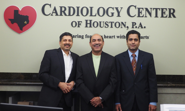 Dr. Randeep Suneja (center) flanked by his partners Dr. Ram Pai (left) and Dr. Kamal Desikan at their practice in Katy.