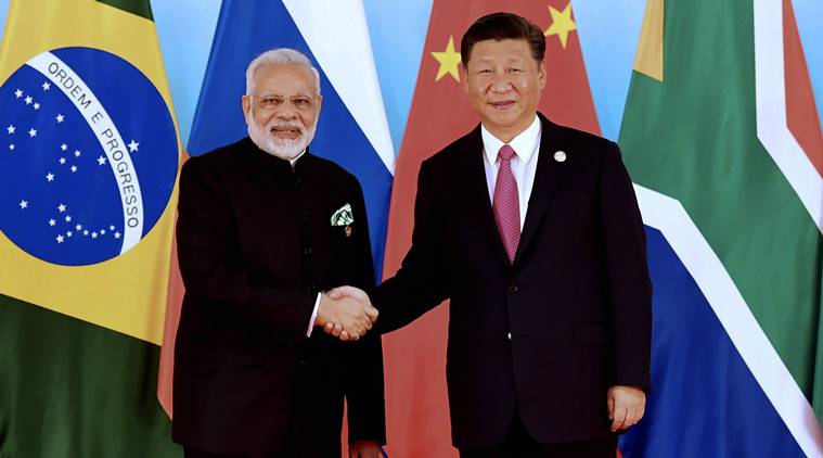 Xiamen : In this photo released by Xinhua News Agency, Chinese President Xi Jinping, right, shakes hands with Indian Prime Minister Narendra Modi at the BRICS Summit in Xiamen in southeastern China's Fujian Province, Monday, Sept. 4, 2017. AP/PTI(AP9_4_2017_000159B)