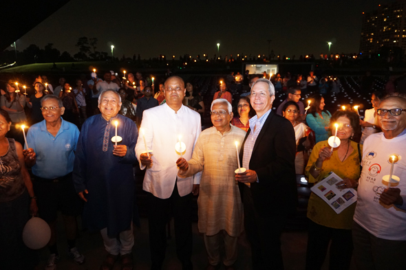 The finale of the evening celebrating Mahatma Gandhi’s 148th birthday as 1000 Lights For Peace at the Miller Outdoor Theatre was candle lighting by all present, as pledge to practice peace in their lives. It was initiated by Consul General of India, Dr. Anupam Ray.