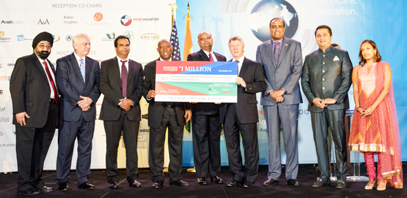 A symbolic check from the Indian American Community “Marching Towards a Million” acknowledging and celebrating the contributions that have already been made was presented to Harris County Judge Ed Emmett and Houston Mayor Sylvester Turner by Consul General Dr. Anupam Ray, Sapphira Goradia, Jagdip Ahluwalia, Allen Richards, Amit Bhandari of BioUrja, Harish Shanbhag of Wipro and Mani Iyer of Mahindra USA. 