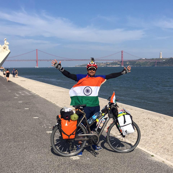 Abhishek Kumar Sharma with his bicycle in New York