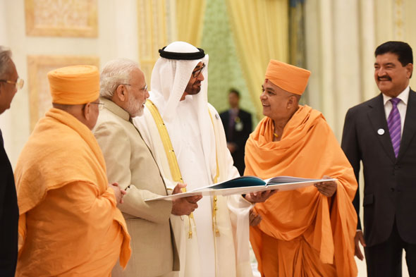 BAPS Swamis meet Indian Prime Minister Narendra Modi and Crown Prince of Abu Dhabi His Highness Sheikh Mohammed bin Zayed Al Nahyan and present an introductory book of plans for the upcoming Hindu Mandir in Abu Dhabi.