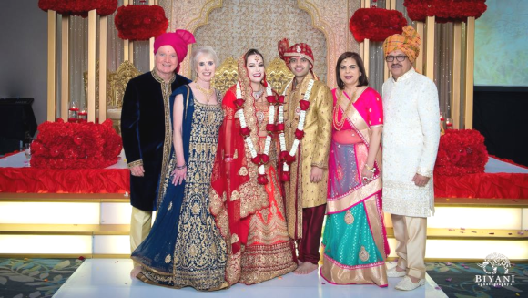 The newlyweds Hiren and Casey Joshi with their parents Richard and Merrilee Espinosa (on the left) and Rakesh and Shoba Joshi on the right.