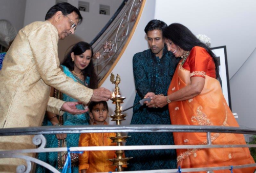 The Moonat family lit the traditional Diwali diya.