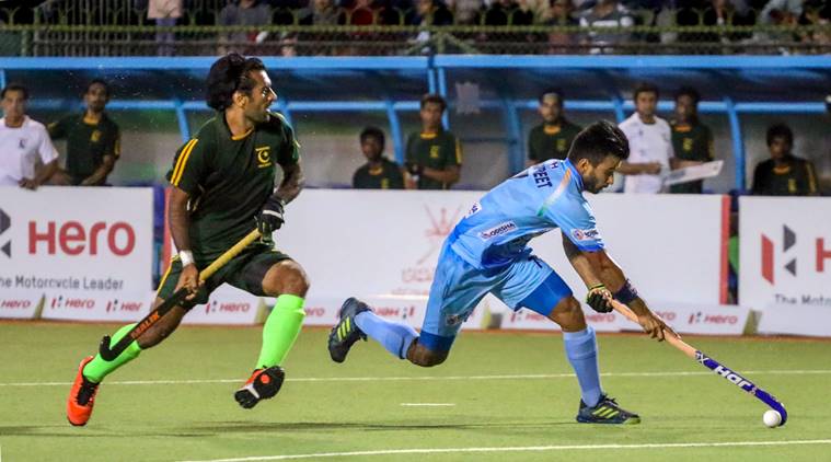 India centre-half Manpreet Singh received a pass just inside India’s half, and embarked on a mazy run, with Pakistan forward Ali Shan shadowing him closely. (PTI Photo)