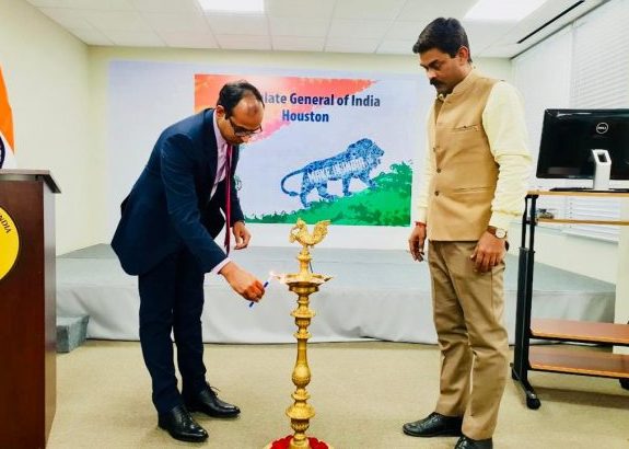Acting Consul General Surendra Adhana Lighting the Lamp